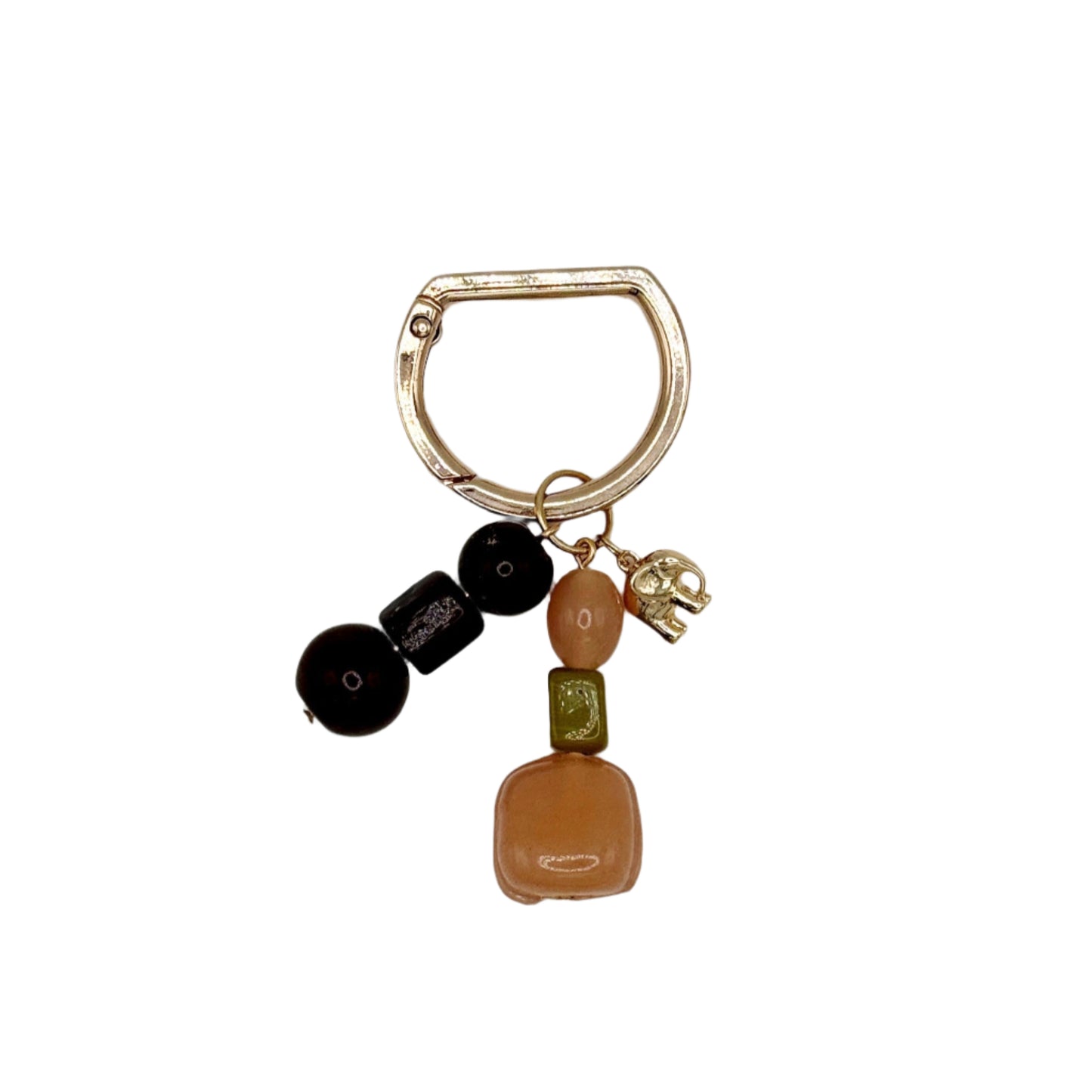 Keychain with colorful beads and a small charm on a white background