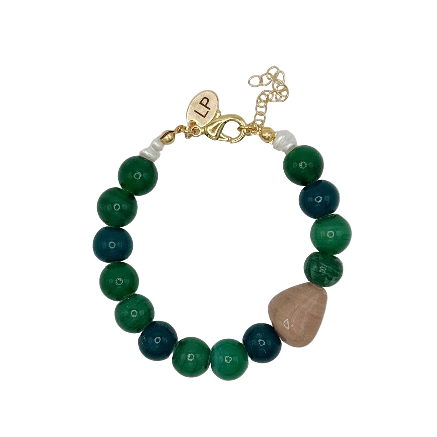 Bracelet with green and blue beads on a light gray background