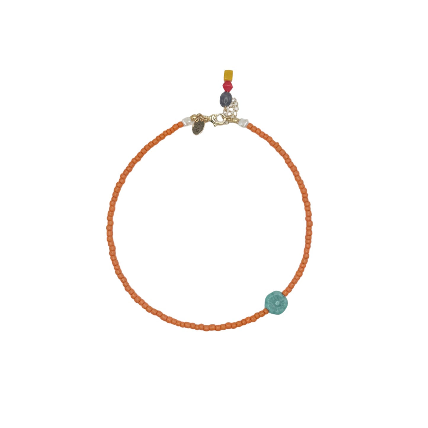 Necklace with orange beads and a turquoise flower on a white background