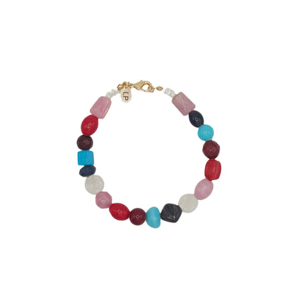 Multicolored beaded anklet on a white background