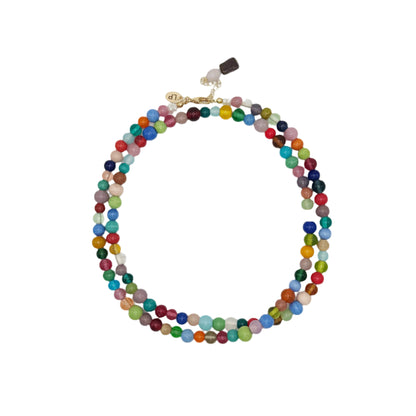 Multicolored beaded necklace on a white background