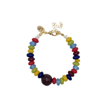 Multicolored beaded bracelet with a gold clasp on a white background