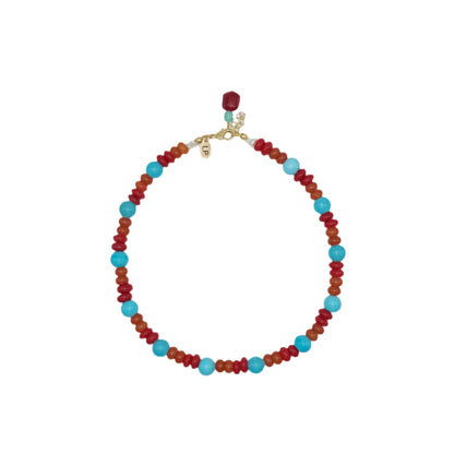 Necklace with red and blue beads on a white background