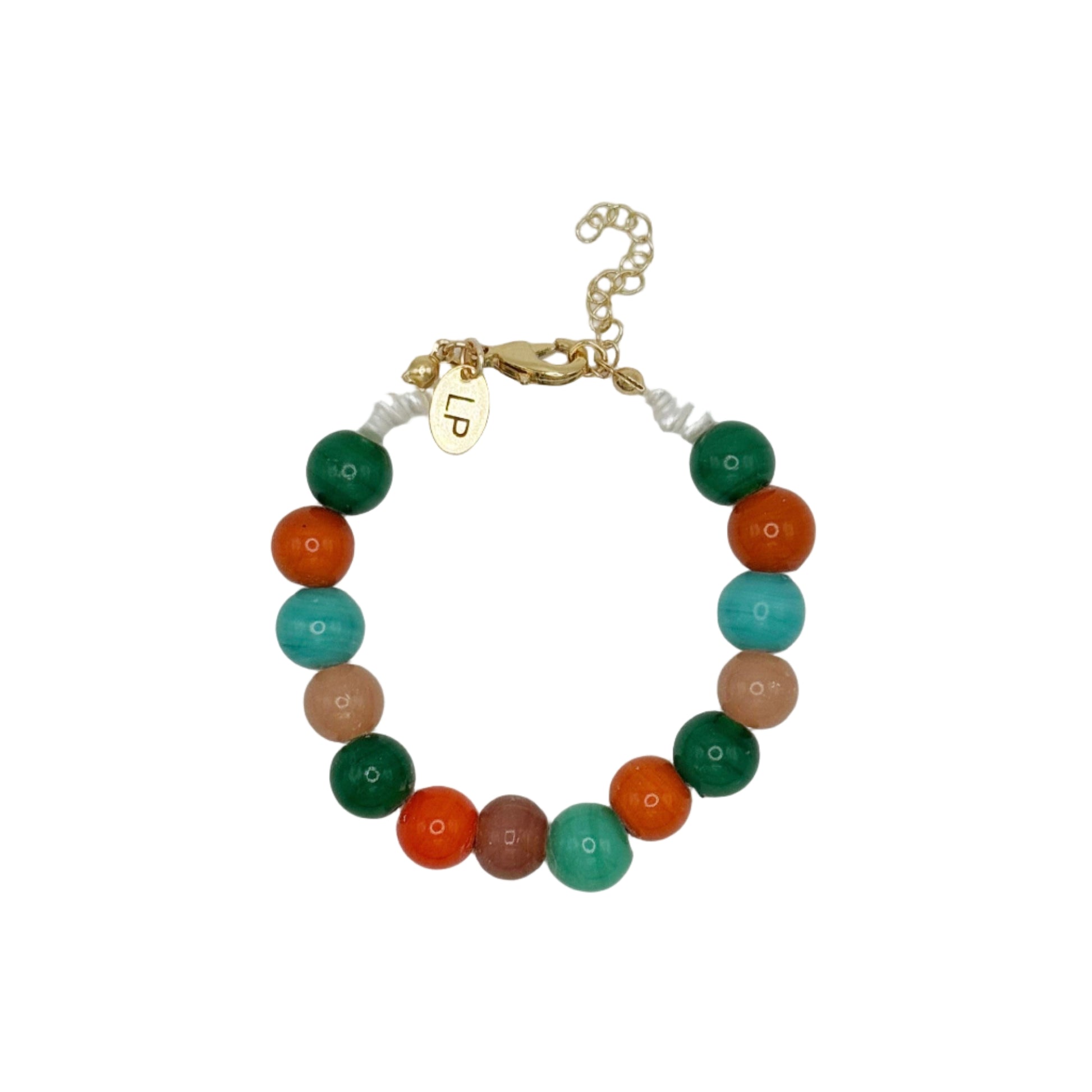 Multicolored beaded bracelet with a gold clasp on a light gray background