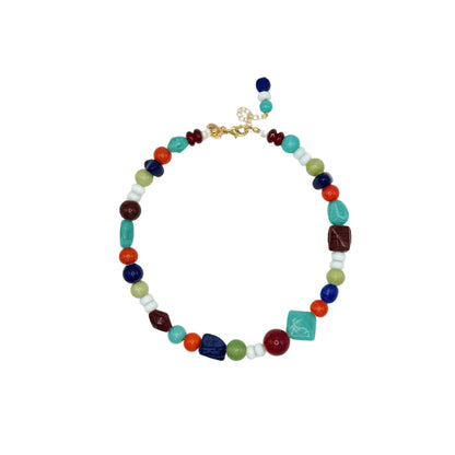 Colorful beaded necklace on a white background