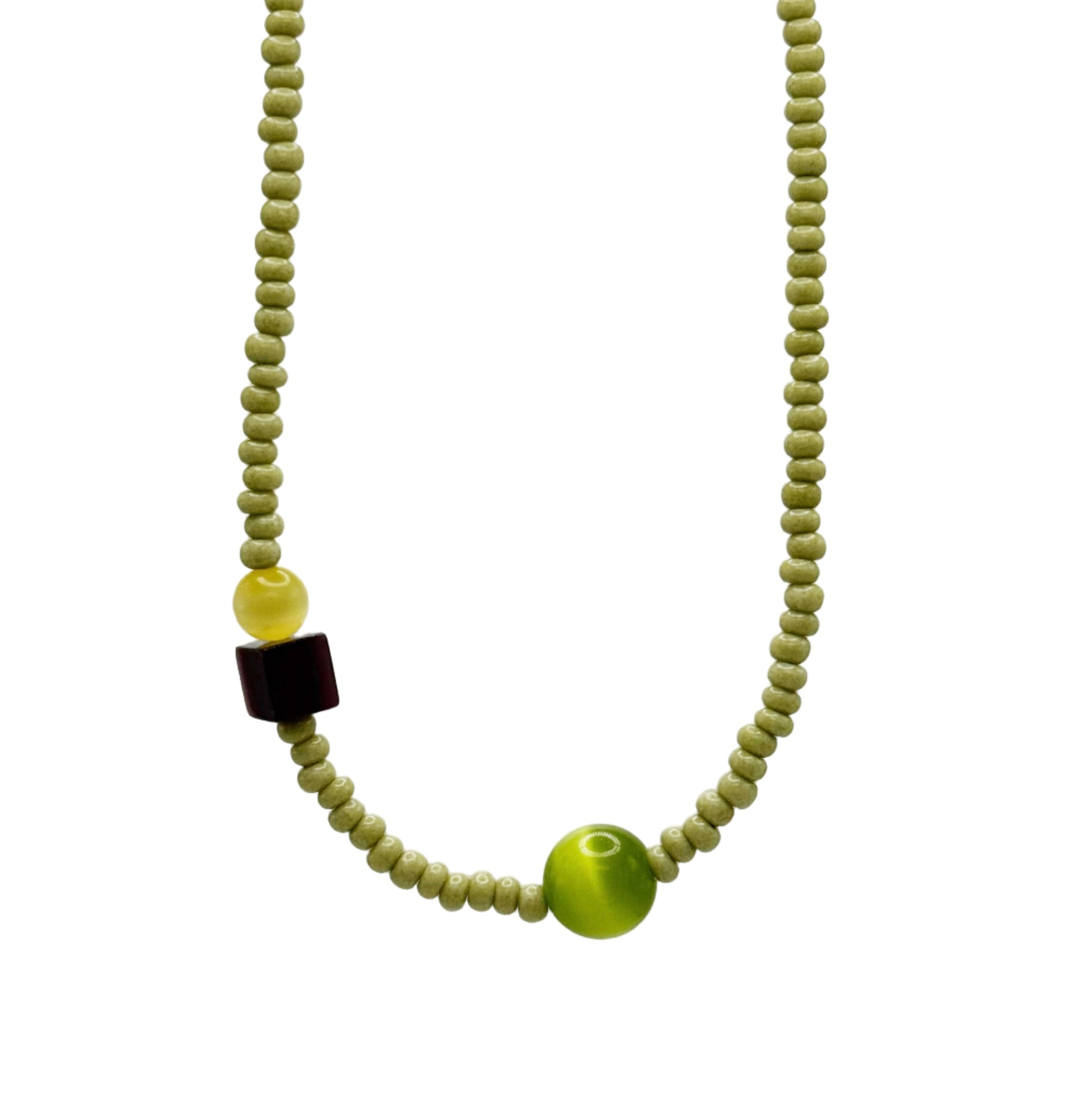 Necklace with green beads on a white background