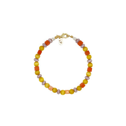 Colorful beaded bracelet on a white background