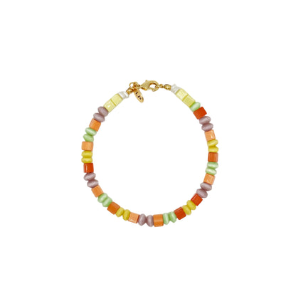 Colorful beaded bracelet on a white background