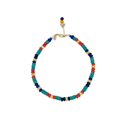 Colorful beaded necklace on a white background