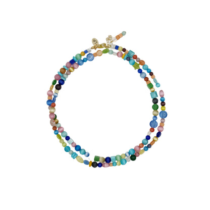 Multicolored beaded necklace on a white background