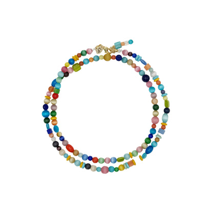 Colorful beaded necklace on a white background