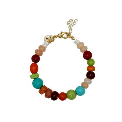 Multicolored beaded bracelet with a gold clasp on a white background