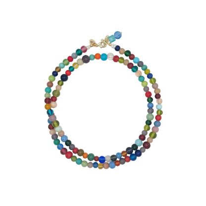 Multicolored beaded necklace on a white background