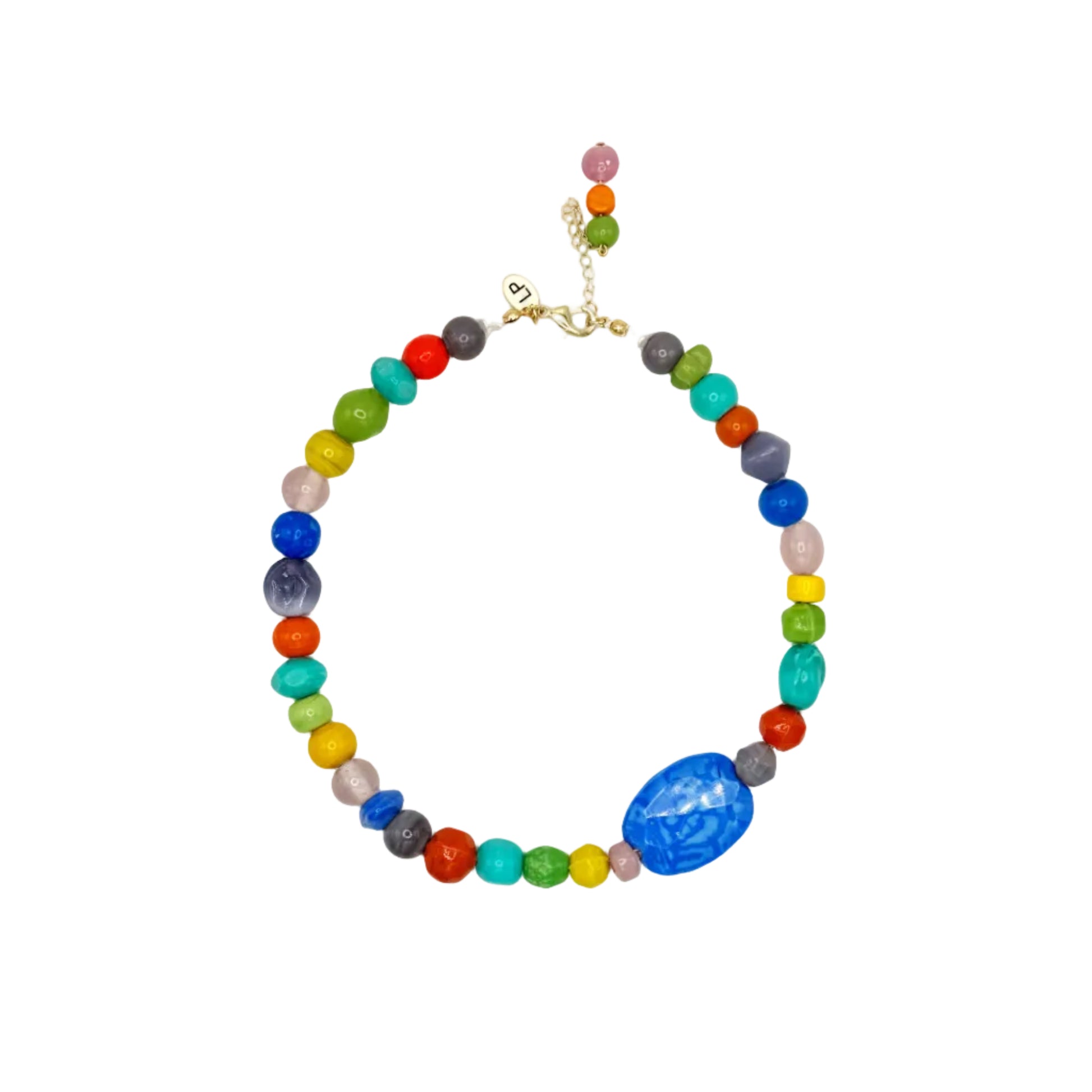 Colorful beaded necklace with a blue focal bead on a white background