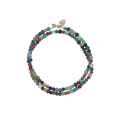 Multicolored beaded necklace on a white background