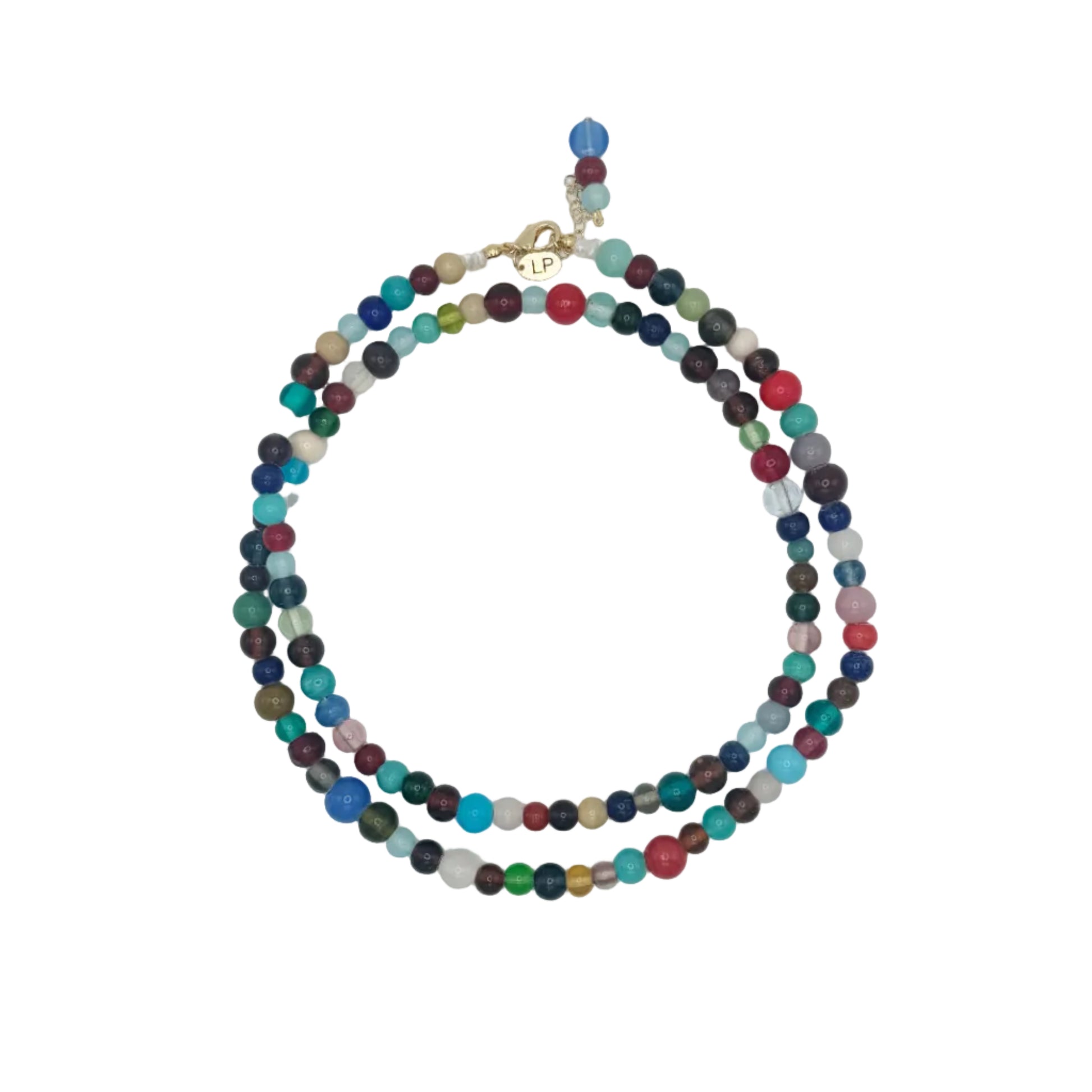 Multicolored beaded necklace on a light gray background