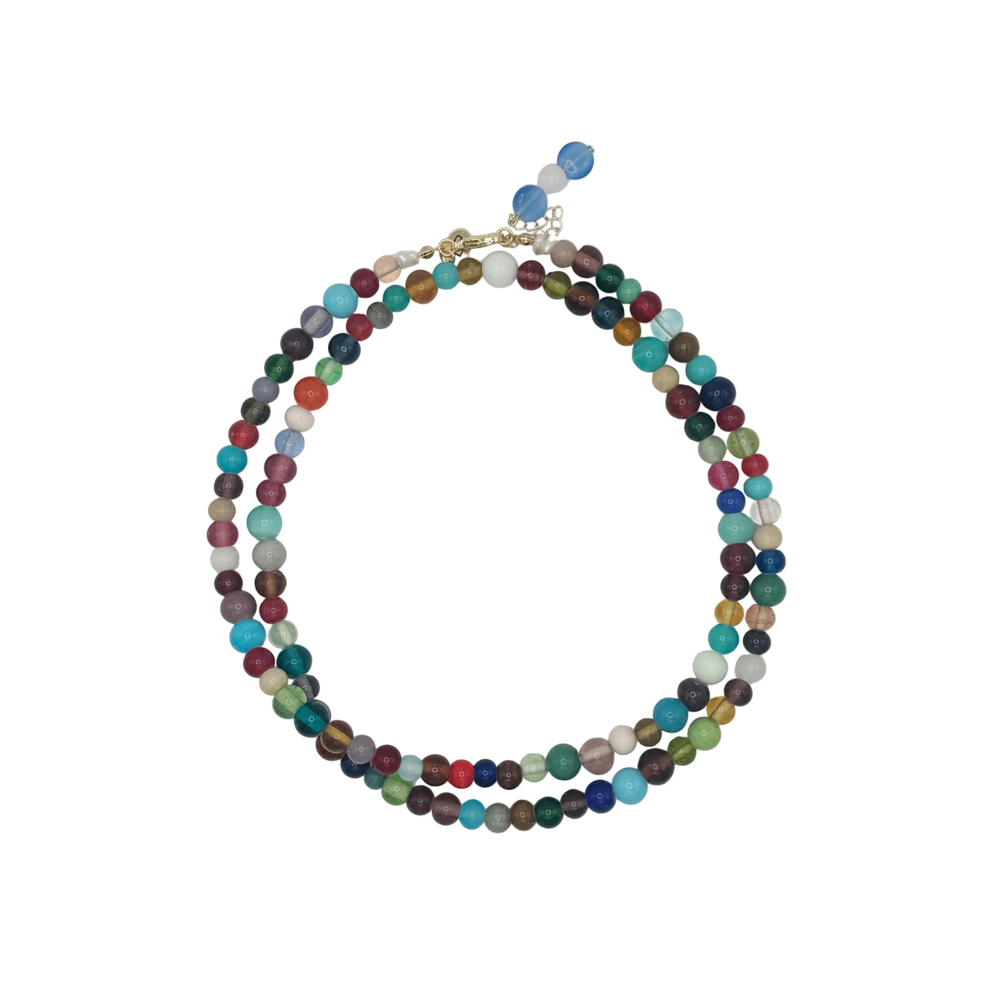 Multicolored beaded necklace on a light gray background