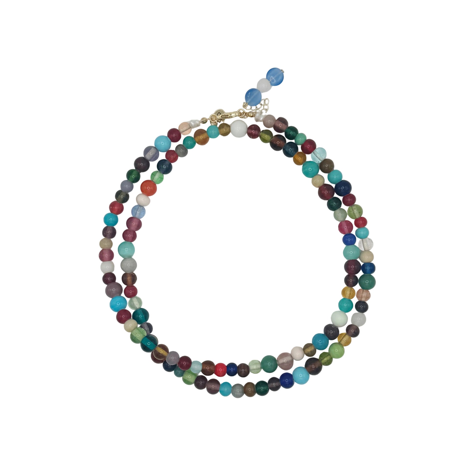 Multicolored beaded necklace on a light gray background