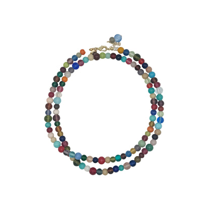 Multicolored beaded necklace on a white background