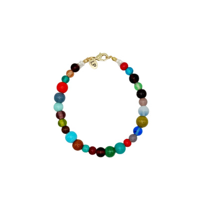 Multicolored beaded anklet on a white background