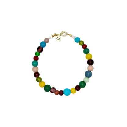 Multicolored beaded anklet on a white background