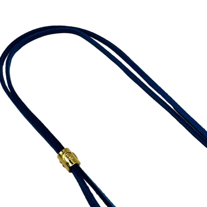 Navy blue lanyard with a gold metal clasp on a light gray background