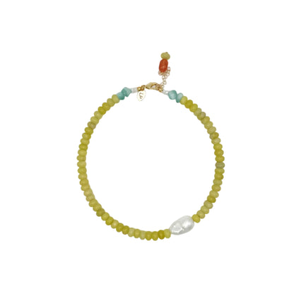 Beaded necklace with a gold clasp on a white background