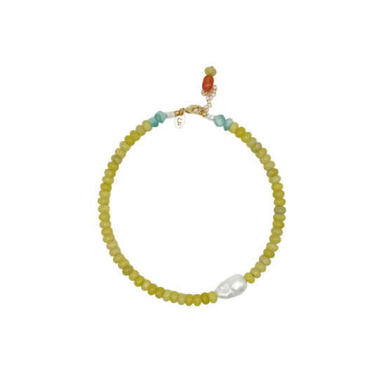 Beaded necklace with a gold clasp on a white background