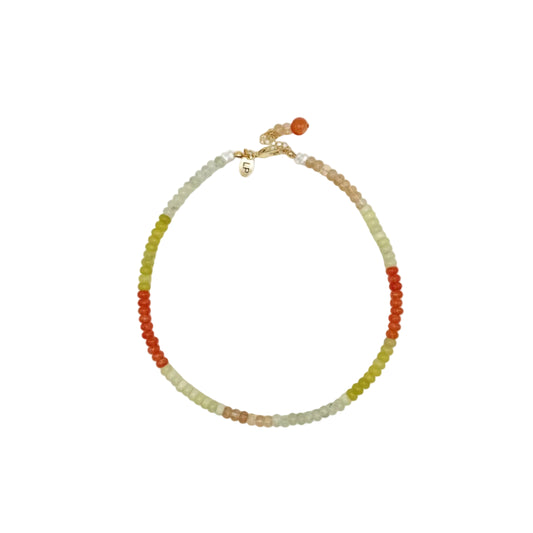 Necklace with multicolored beads on a white background