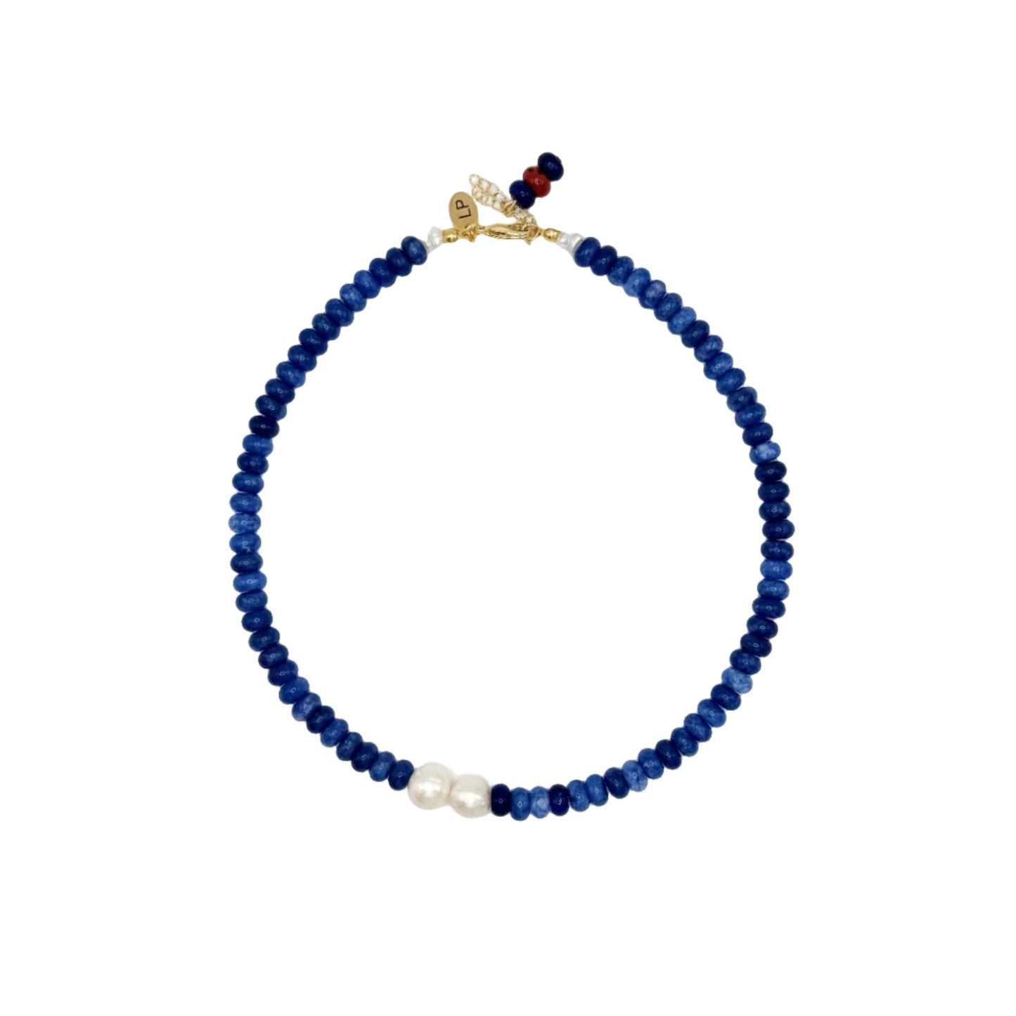 Necklace with blue beads and a gold clasp on a white background