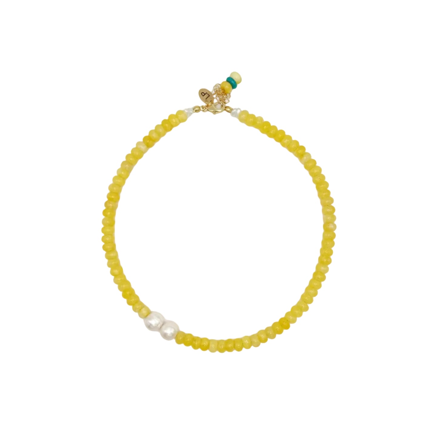 Yellow beaded necklace on a white background