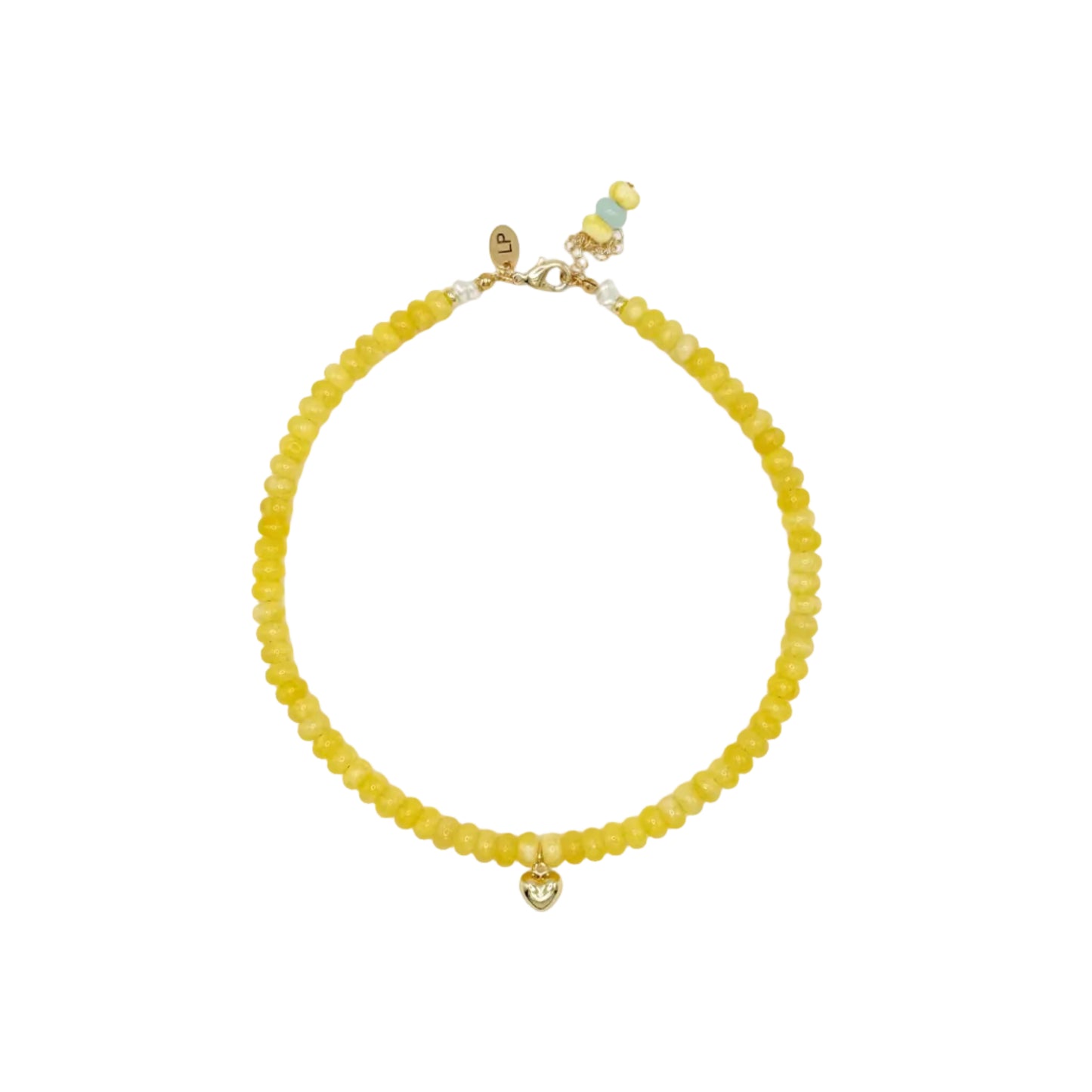 Yellow beaded bracelet on a white background