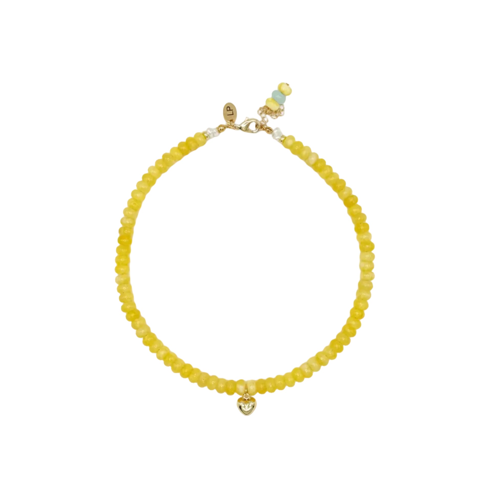 Yellow beaded bracelet on a white background