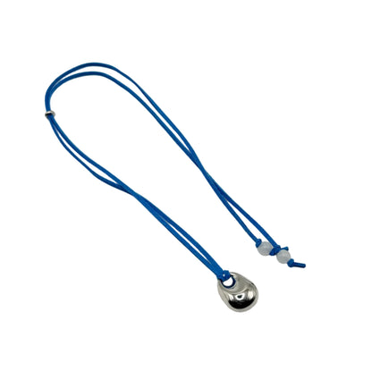 Blue lanyard with a silver pendant on a white background