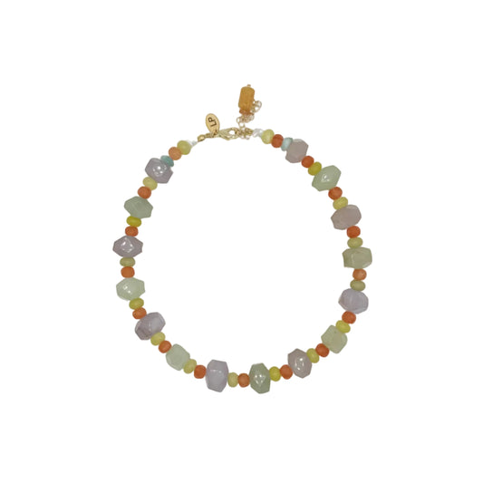Necklace with multicolored beads on a white background