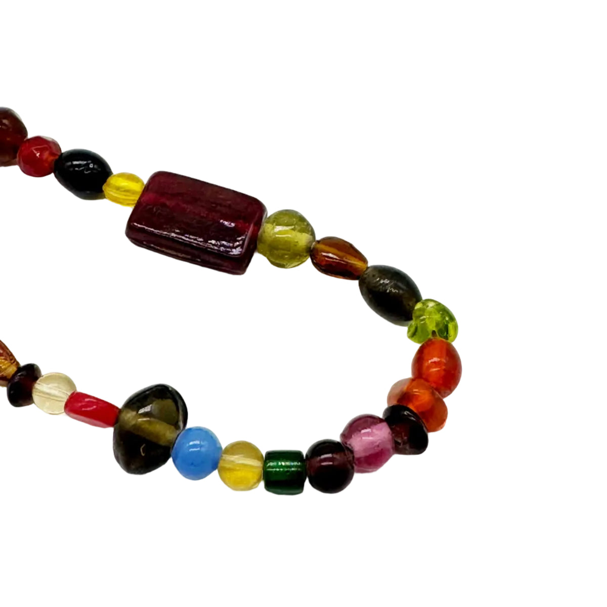 A beaded necklace featuring a large rectangular dark red bead and multiple colorful round and teardrop beads in red, yellow, green, blue, brown, and black, displayed on a clean white background.