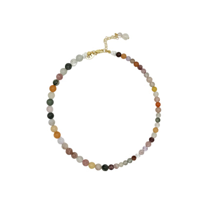 A beaded necklace made of small multicolored round beads with a gold clasp, displayed on a plain white background.