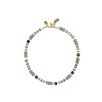 A beaded necklace featuring light green faceted beads, small brown wooden beads, and a gold clasp, displayed on a clean white background.