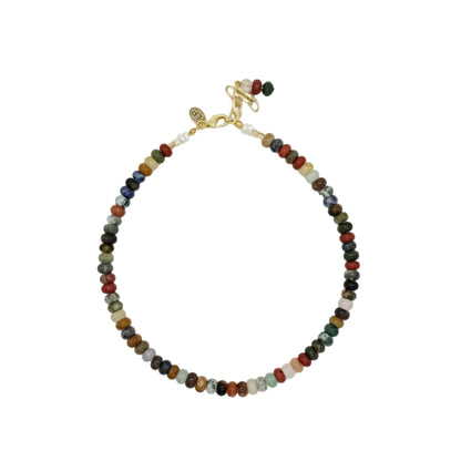 A beaded necklace with small multicolored round beads and a gold clasp, photographed on a plain white background.