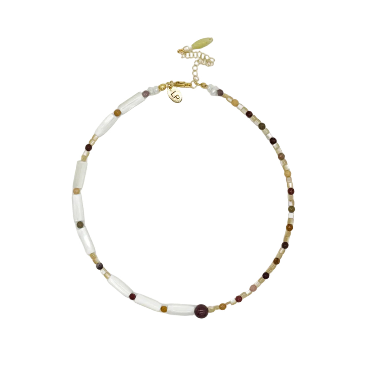 A delicate beaded necklace with white cylindrical beads, small brown and dark beads, and gold-toned metal accents, displayed on a clean white background.