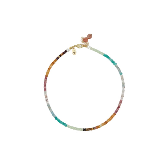 Multicolored beaded necklace on a white background